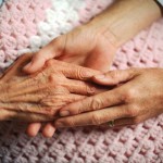 holding-hands-with-elderly-patient
