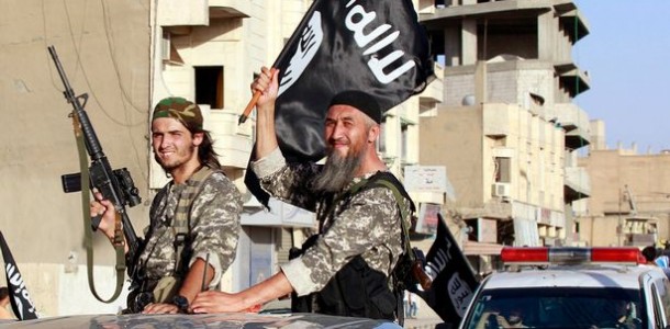 Militant-Islamist-fighters-wave-flags