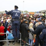 policemen-maintain-order-after-migrants-attempted-to-leave-the-border-crossing-in-nickelsdorf