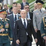 vladimir-putin-walks-with-his-generals-300930
