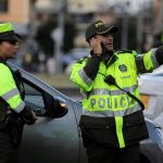 police-work-close-to-the-scene-where-a-car-bomb-exploded-according-to-authorities-in-bogota