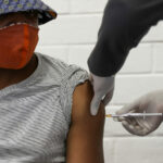 a-volunteer-receives-an-injection-from-a-medical-worker-during-the-countrys-first-human-clinical-trial-for-a-potential-vaccine-against-the-novel-coronavirus-in-soweto