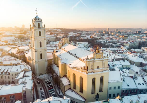 beautiful-vilnius-city-panorama-in-winter-with-snow-covered-houses-chruches-and-streets-aerial-evening-view