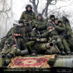 members-of-the-armed-forces-of-the-separatist-self-proclaimed-donetsk-peoples-republic-drive-a-tank-on-the-outskirts-of-donetsk