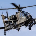 boeing-ah-64d-apache-attack-helicopter-in-flight-veluwe-the-ne