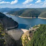 aerial-top-view-on-vidraru-dam-reservoir-lake-and-fararas-mountains-romania