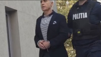Video Georgescu încătușat și în dungi pentru a treia zi la DIICOT. Soția Umilitor și traumatizant modul în care Călin a fost încătușat